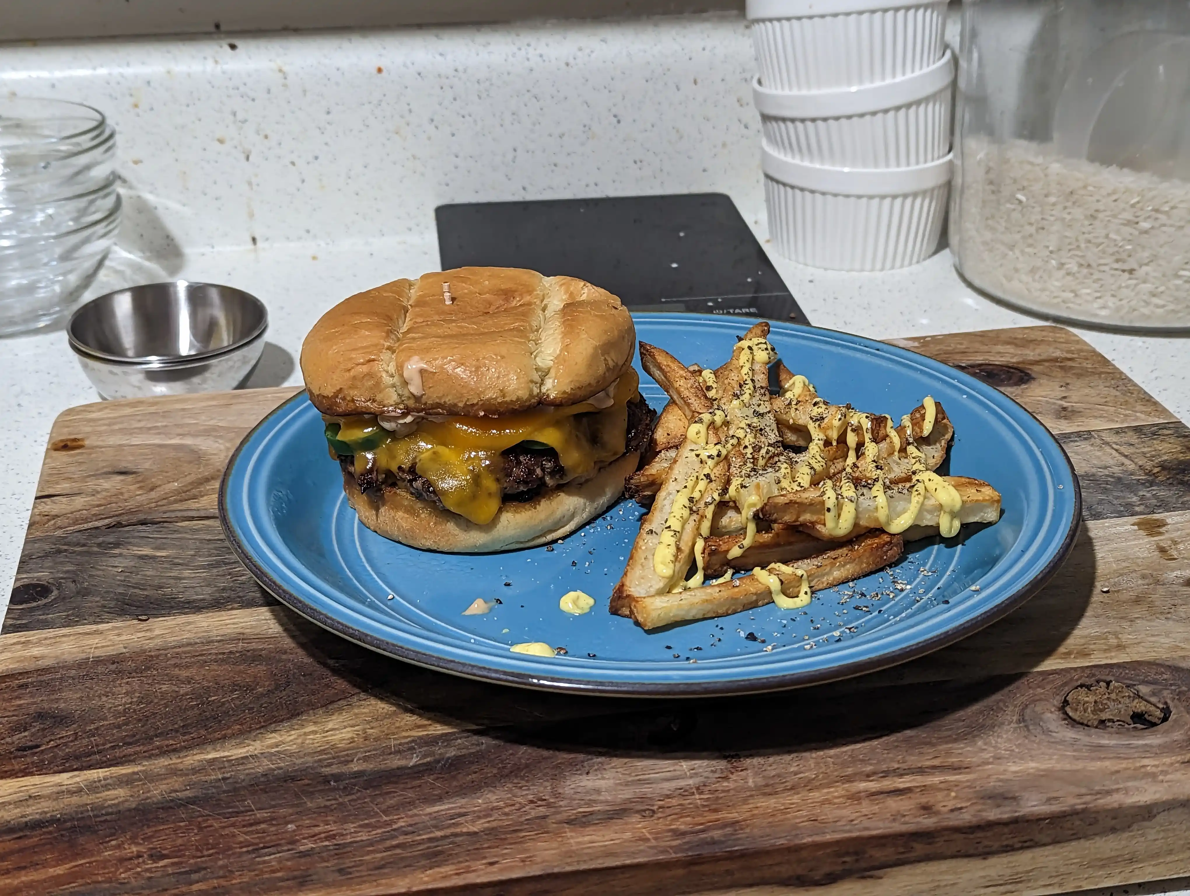 Jalapeno Cheddar Burger served with fries