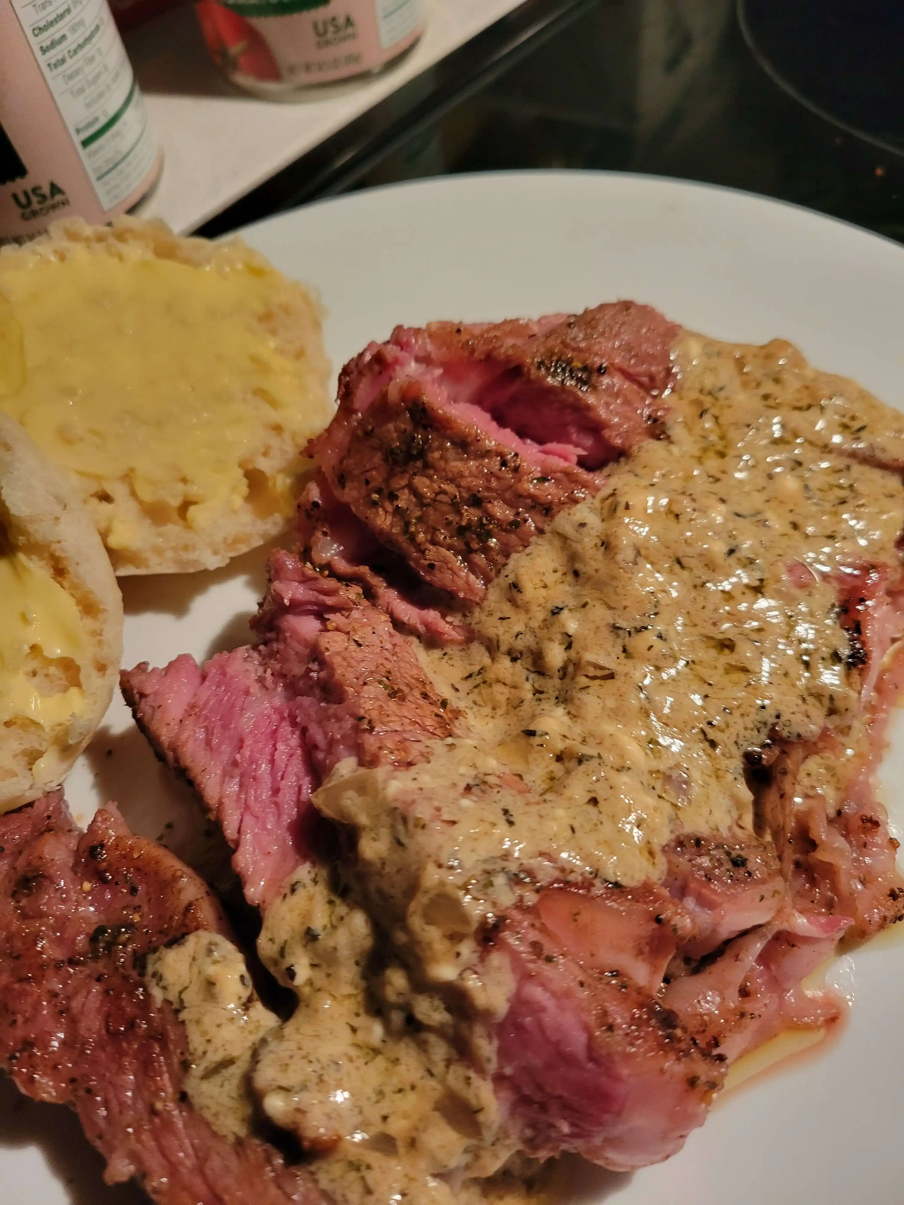 Steak served with sauce on top